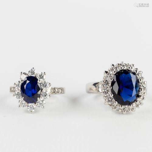 Two 'Lady Diana' rings, silver with a large blue stone. Ring...