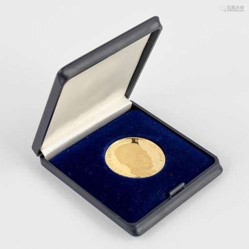 A gold coin 'Albert 1, Rex Belgarum 1875-1934-1984', 18kt, 1...