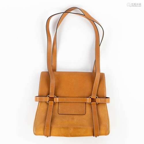 Delvaux, a brown leather handbag, original fabric storage ba...