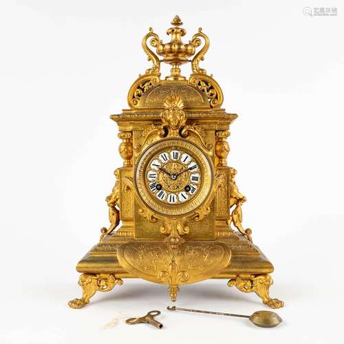 A mantle clock, Neoclassical style, gilt spelter. 19th C. (D...