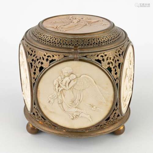 A storage box, brass with sculptured plaques in limestone, '...
