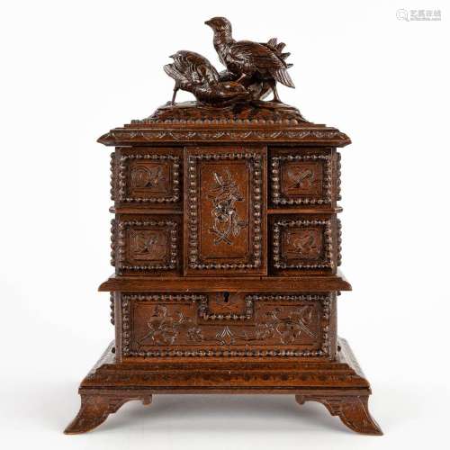 A jewelry box, sculptured wood, decor of birds and flowers, ...