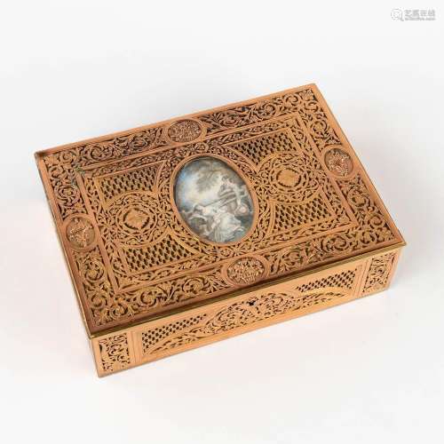 A jewellery box, ajoured brass and finished with a miniature...