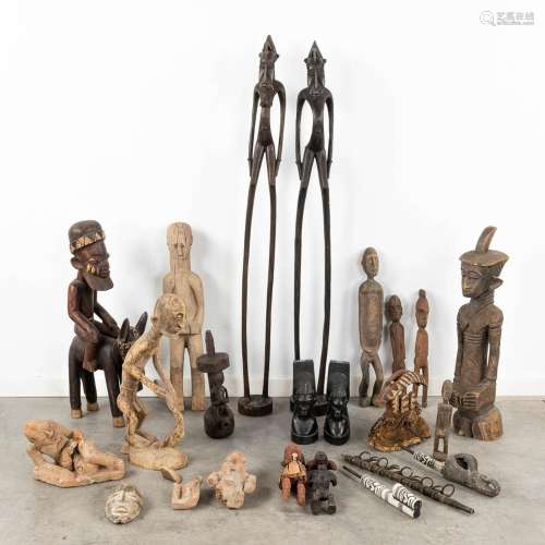 A collection of African masks and ceramic items. (H:124 cm)