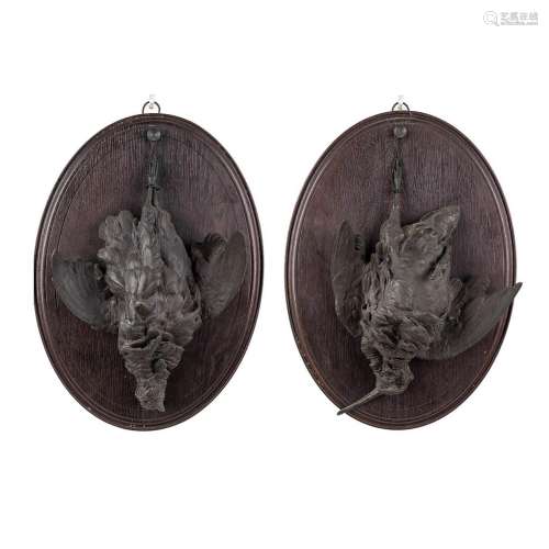A pair of wall-mounted 'Hunting Trophies', patinated bronze ...