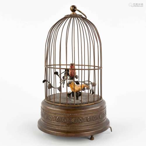 A bird cage automata with a music box. (H:28 x D:15,5 cm)