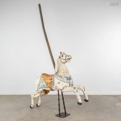 An antique horse for a Merry Go Round, made of sculptured wo...