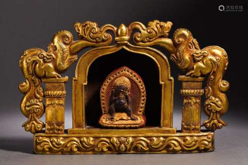 A Bronze-gilt Deity with Shrine