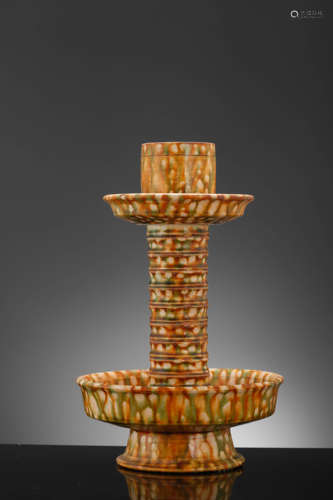 A Sancai Glaze Candlestick