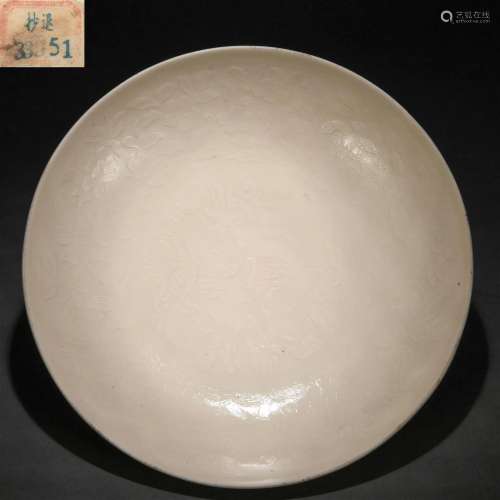 A Chinese Incised Ting-ware Dragon Dish