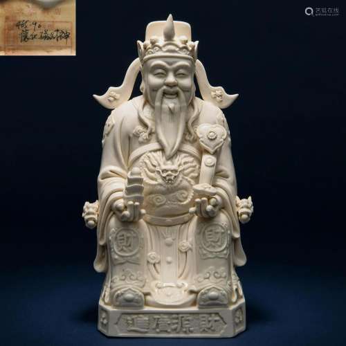 A Chinese Blanc-de-Chine Seated God of Wealth