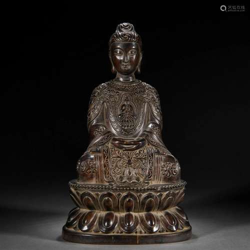 A Chinese Carved Aloeswood Seated Amitabha