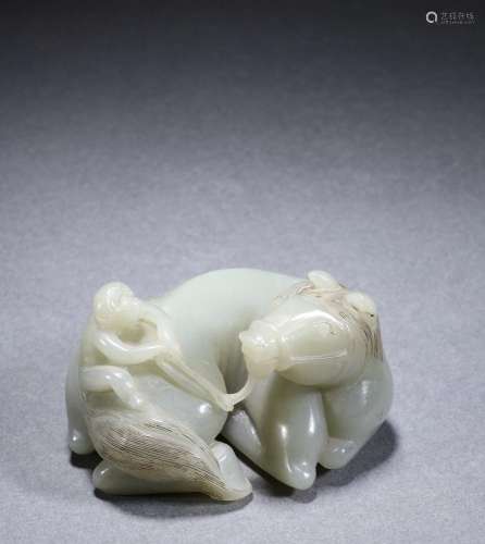 A Carved White Jade Monkey on Horse