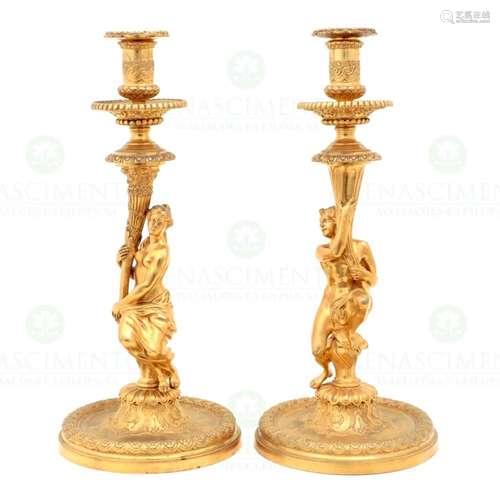 A PAIR OF CANDLESTICKS