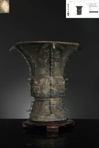 A Bronze Taotie Beaker Vase