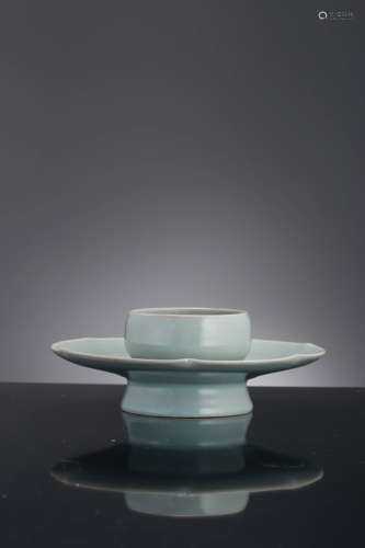 A Longquan Kiln Lobed Tea Cup And Saucer Set