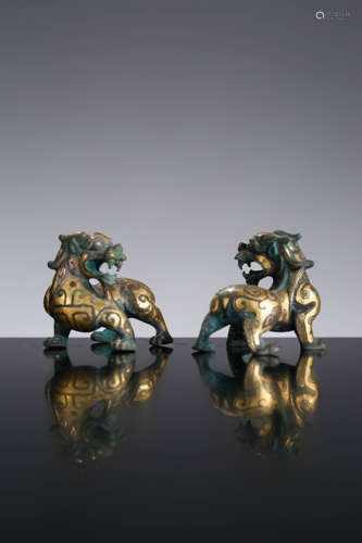 A Pair Of Gold And Silver Inlay Mythical Beasts