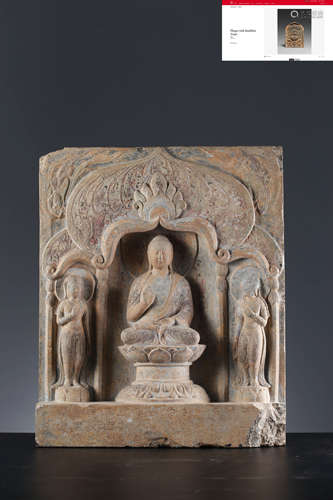 A Carved Stone Buddha Statue And Shrine