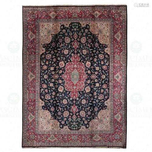 AN ORIENTAL CARPET