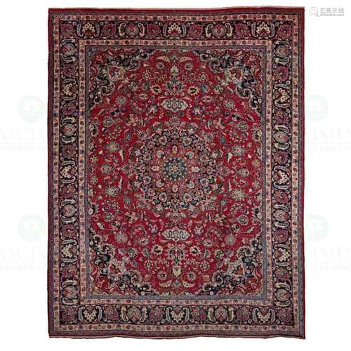 AN ORIENTAL CARPET