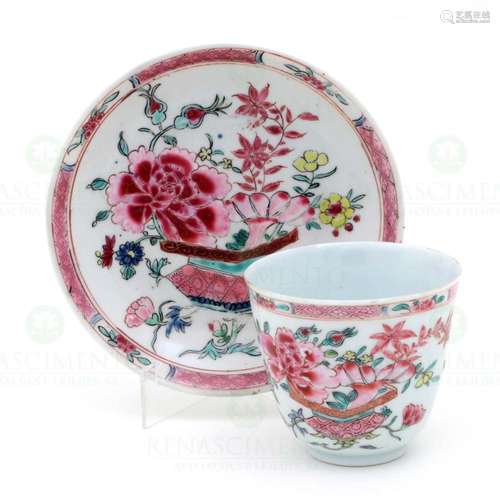 A CUP AND SAUCER