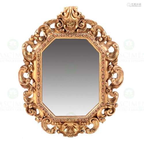 A BAROQUE WALL MIRROR