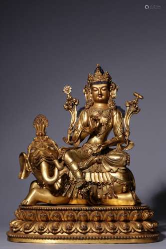 A gilt-bronze figure of Puxian Bodhisattva