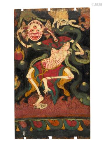 A PAINTED WOOD DOOR WITH A CHITIPATI FIGURE TIBET, 19TH CENT...
