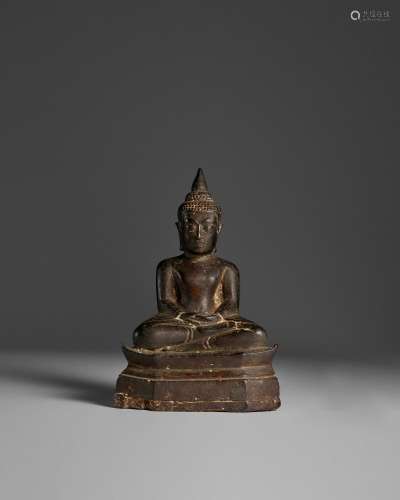 A COPPER ALLOY SEATED BUDDHA NORTHERN THAILAND, 16TH-19TH CE...