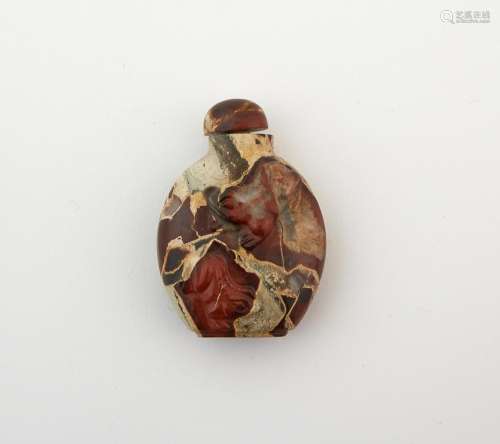 A Chinese Carved Variegated Hardstone Snuff Bottle Height 2 ...