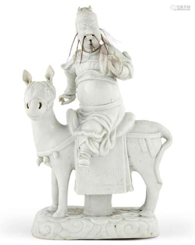 A Chinese Dehua Porcelain Figure of Guan Yu on Horseback Hei...