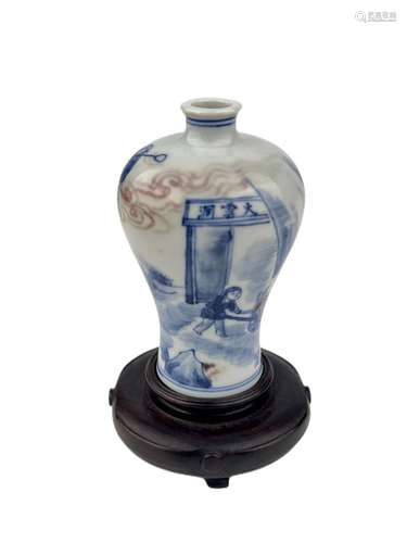 An underglaze red snuff bottle, depicted a scene of the Monk...