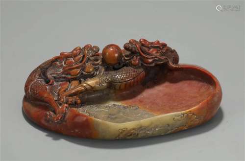 A CHINESE CARVED SOAPSTONE DRAGONS INKWELL
