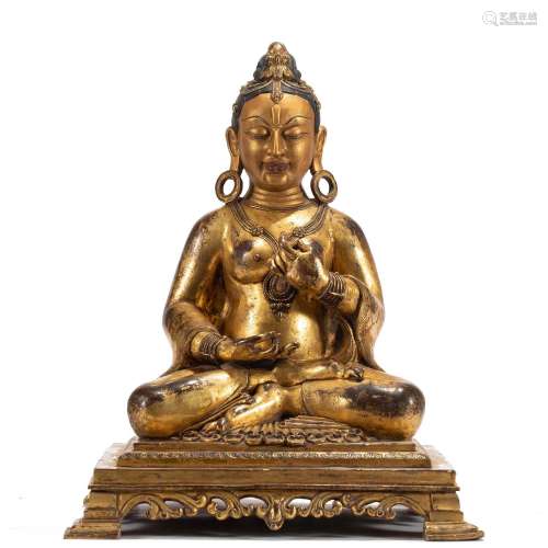 A TIBETAN BRONZE-GILT TARA