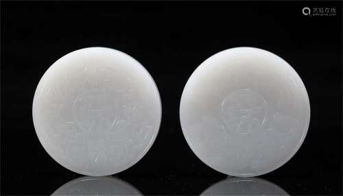 TWO CHINESE CARVED WHITE JADE COINS