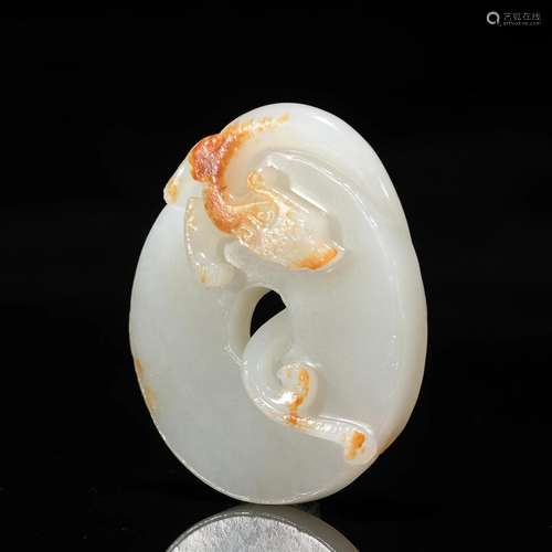 A CHINESE CARVED WHITE JADE PENDANT