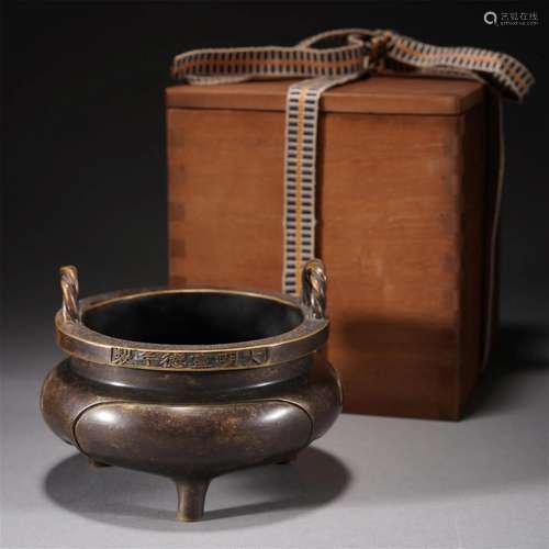 A CHINESE BRONZE TRIPOD CENSER