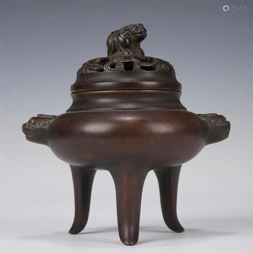 A CHINESE BRONZE TRIPOD CENSER