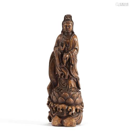 A CHINESE CARVED ALOES WOOD STANDING GUANYIN