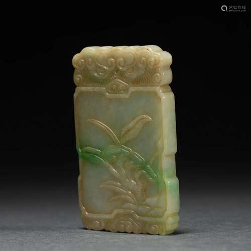 A CHINESE CARVED JADEITE ORCHID PLAQUE