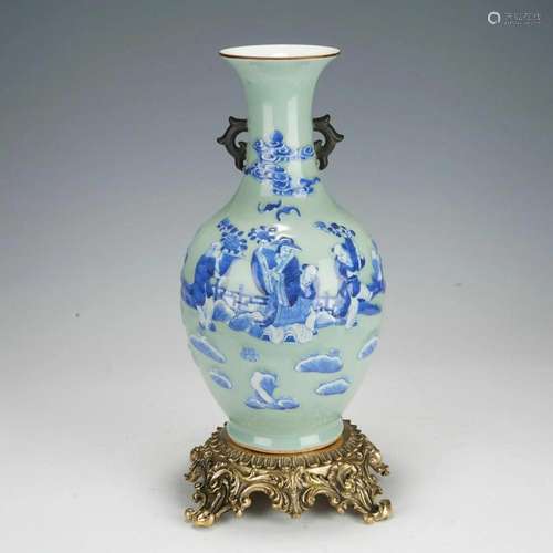 AN ORMOLU CELADON GROUND AND UNDERGLAZE BLUE VASE