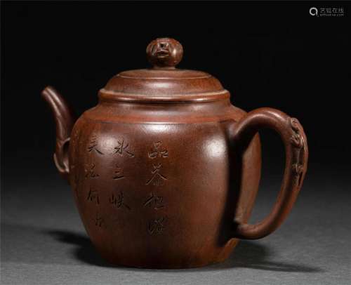 A CHINESE INSCRIBED YIXING-GLAZE TEAPOT