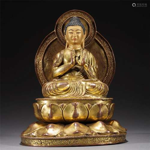 A CHINESE BRONZE-GILT BUDDHA