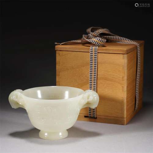 A CHINESE CARVED WHITE JADE RAM VESSEL