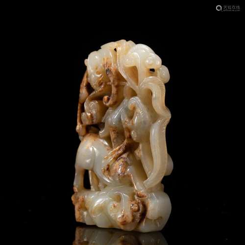 A CHINESE CARVED JADE ORNAMENT