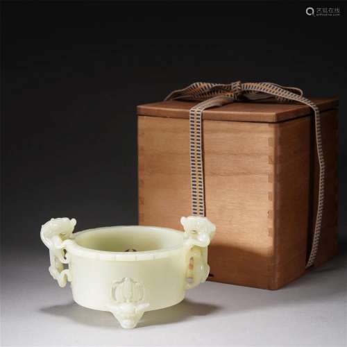 A CHINESE CARVED WHITE JADE TRIPOD CENSER