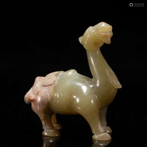 A CHINESE CARVED JADE CAMEL
