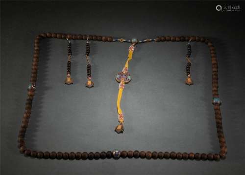 A CHINESE IMPERIAL ALOES-WOOD ROSARY