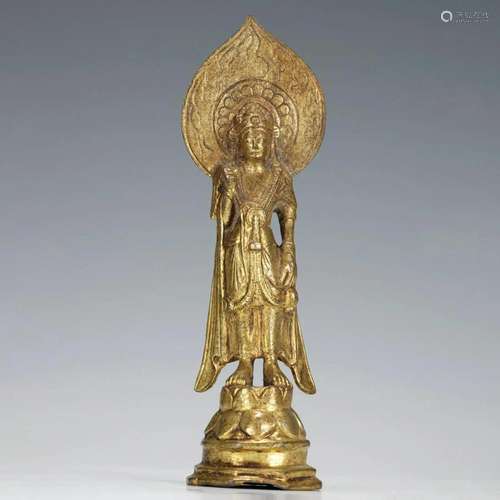 A CHINESE BRONZE-GILT STANDING AVALOKITESVARA