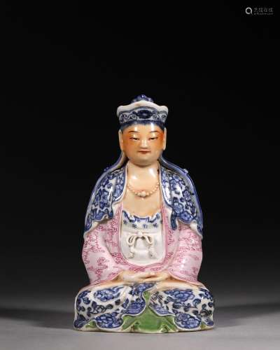 A blue and white famille rose porcelain Guanyin statuette